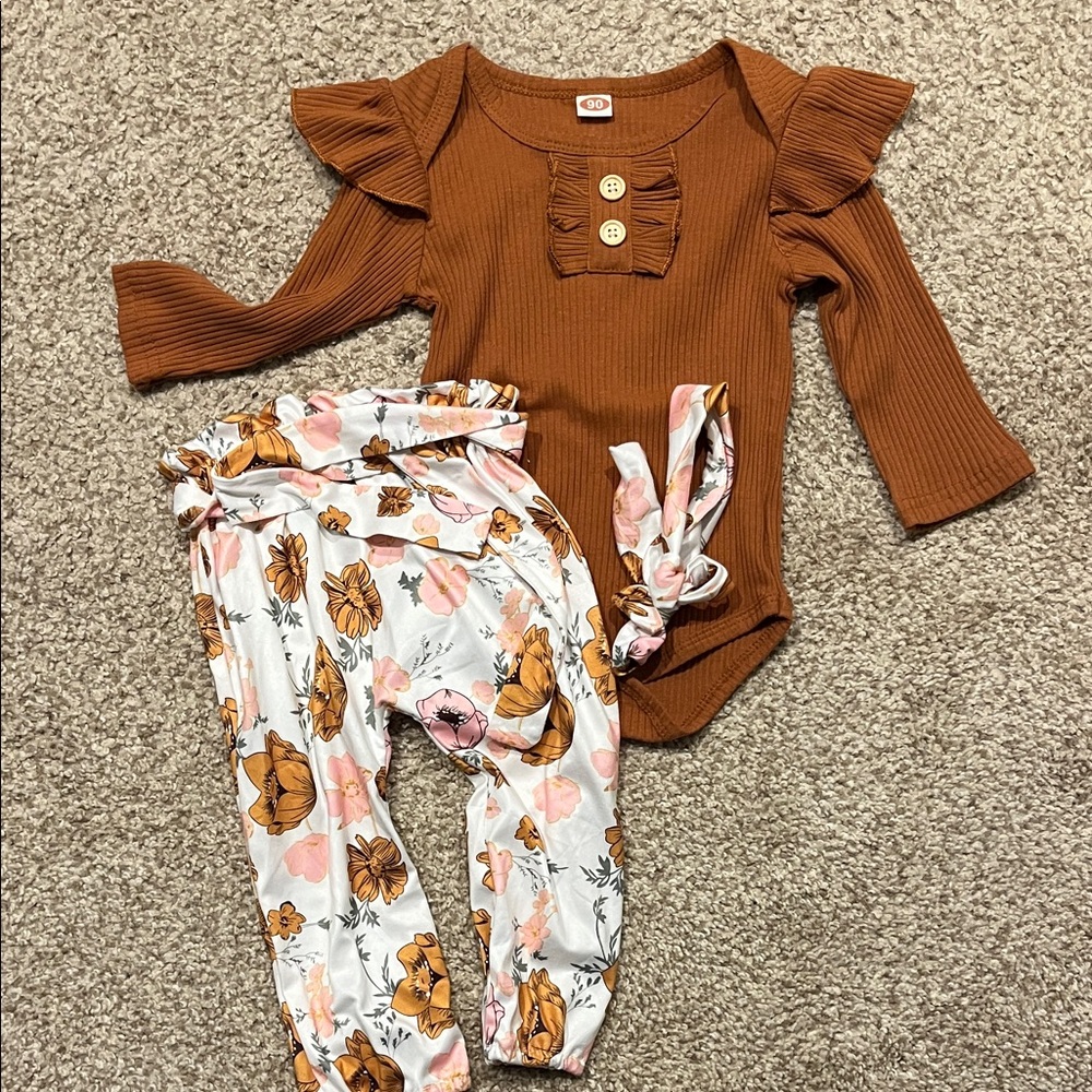 NWOT baby girl outfit. Pants, onesie, and bow.